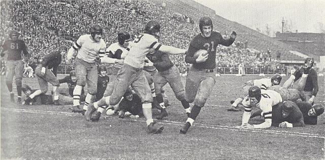 Michigan halfback Herman Everhardus scoring a touchdown against Chicago in 1933