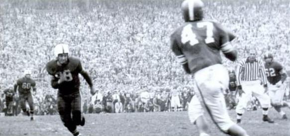 The Transcontinental Pass: Michigan State quarterback Al Dorow about to score a late touchdown to beat Ohio State 24-20 in 1951
