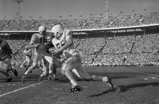 Oklahoma halfback Tommy McDonald carrying against Maryland in the 1956 Orange Bowl
