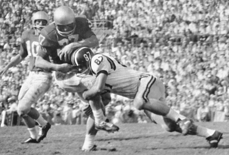 Missouri end Dan LaRose making a tackle in 1960