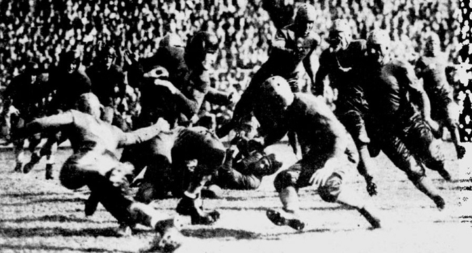 Minnesota halfback Pug Lund carrying against Pittsburgh in 1934